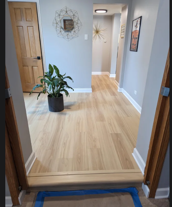 Flooring in Light Wood Color with White Trim (First Choice)